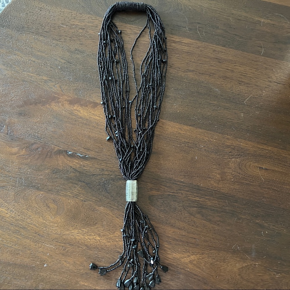 Long Blackbeard multi strand necklace.